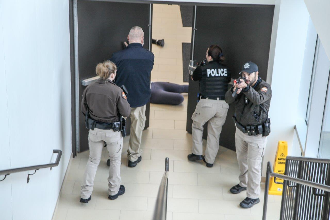 A team of first responders methodically move through the Catoosa County Campus during an Active Shooter Drill on November 30. From left, Deputy LeeAnn Moody, Catoosa County Sheriff’s Department; Deputy Doug Licklider, Catoosa County Sheriff’s Department; Detective Jennifer Jones, Ringgold Police Department (GNTC Police); and Nigel Torres, Catoosa County Sheriff’s Department.