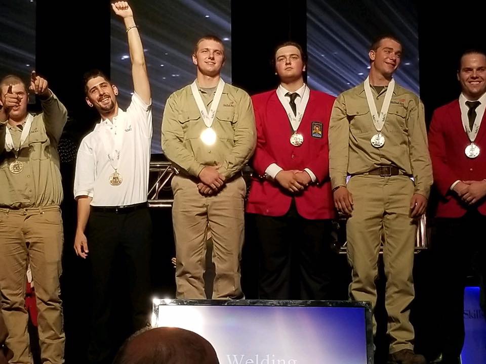 Cedartown, Georgia’s Ryan Fincher becomes Georgia Northwestern Technical College’s first-ever national champion in the 2017 SkillsUSA competition in Louisville, Kentucky. Fincher, shown third from the left, poses alongside his other Top-10 finishers on the medal stage in Louisville, Kentucky. Fincher is a three-time Georgia SkillsUSA champion, twice on the high school level and once on the collegiate level.