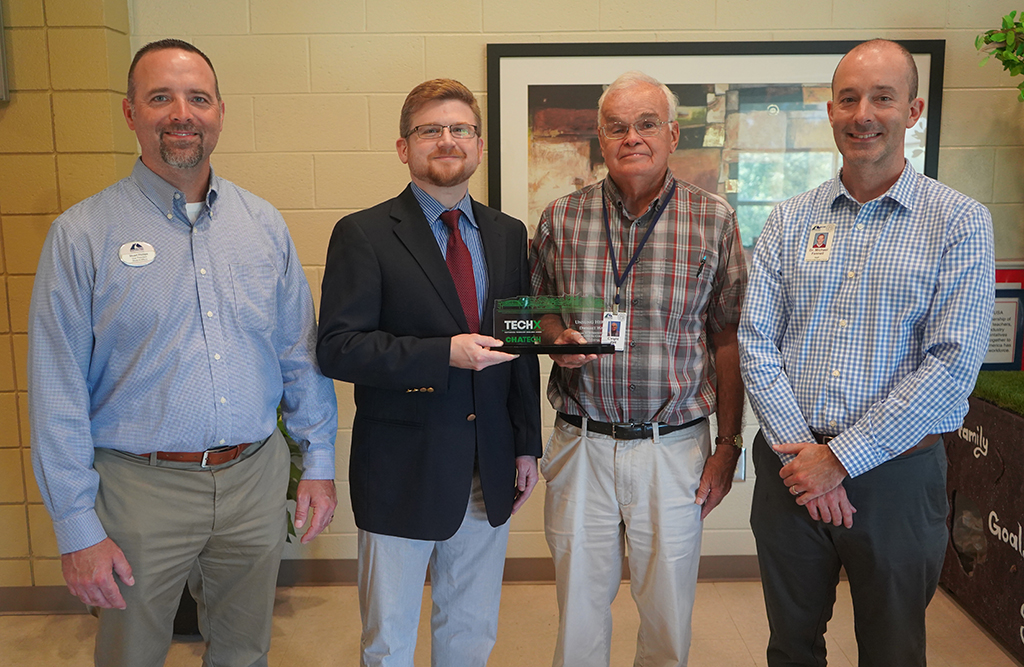 GNTC’s Dwight Watt was named the 2021 Unsung Tech Hero of the Year by the Chattanooga Technology Council. (From left to right) Stuart Phillips, vice president of Student Affairs at GNTC; Walton Robinson, ChaTech’s Executive Director; Dwight Watt, instructor of Computer Information Systems Technology at GNTC; and Michael Fennell, dean of Business and Public Services Technologies at GNTC. 