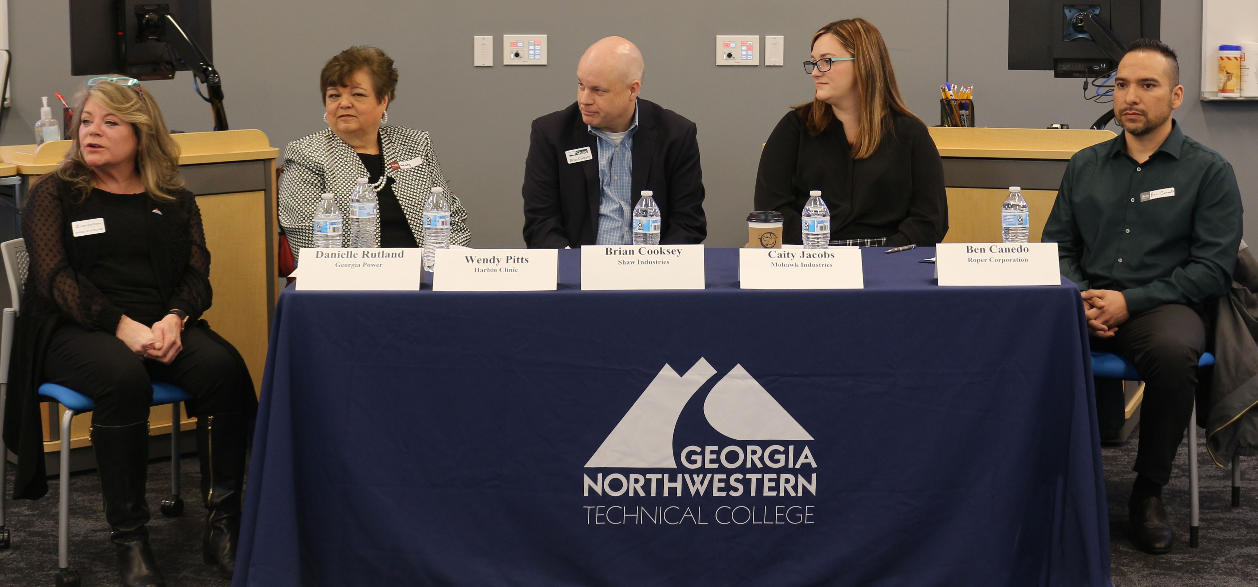 (From left) Danielle Rutland, Workforce Strategy manager at Georgia Power; Wendy Pitts, chief operating officer at Harbin Clinic; Brian Cooksey, Workforce Development director at Shaw Industries Group Inc.; Caity Jacobs, Talent Acquisition program manager — Training at Mohawk Industries Inc.; and Ben Canedo, senior Human Resources business partner at Roper Corporation, participate in the employer’s perspective panel discussion.