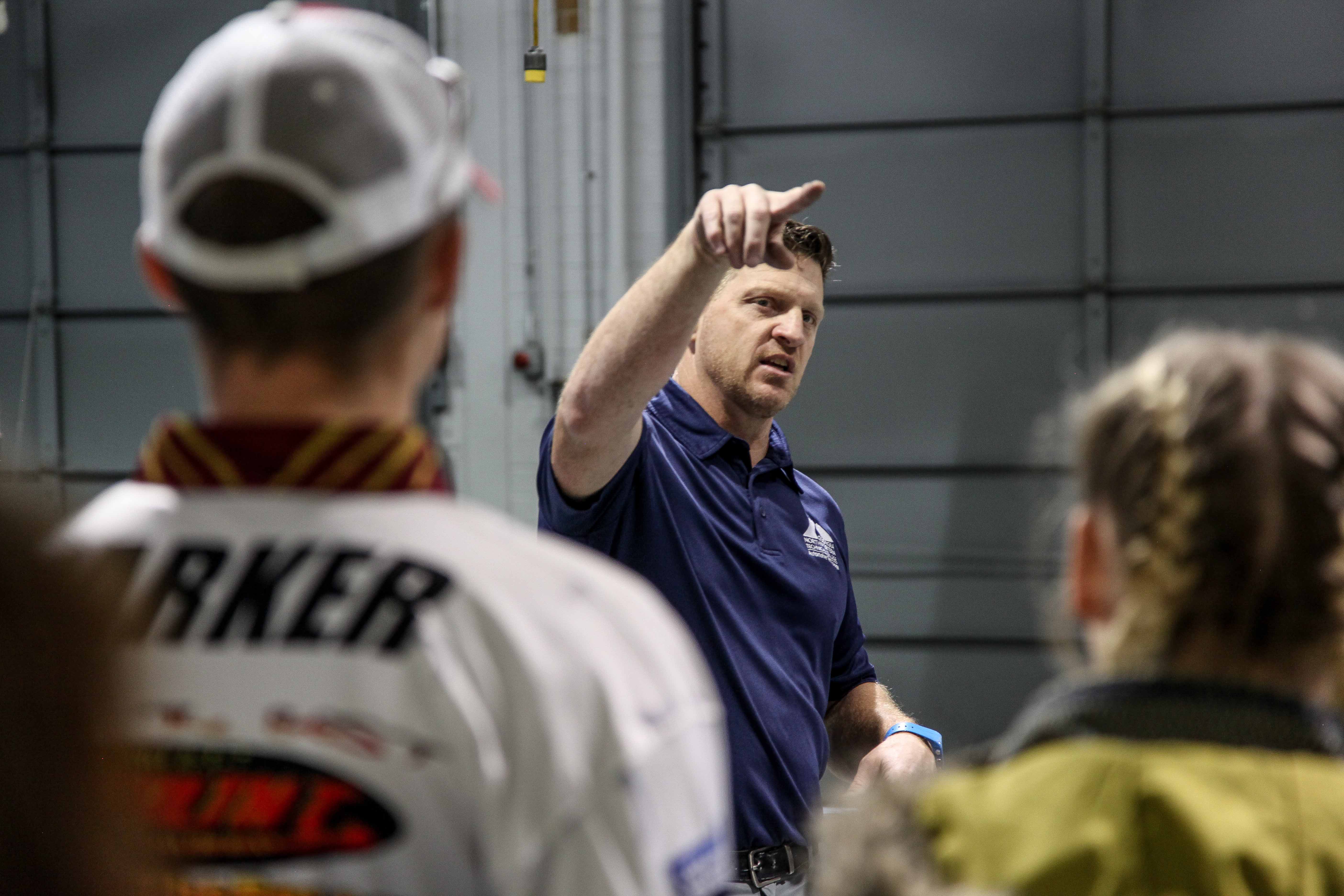 Georgia Northwestern Technical College Automotive Technology Program Director Troy Peco gives a tour of his program’s facilities on the Walker County Campus during the 2018 Transition Fair November 2.