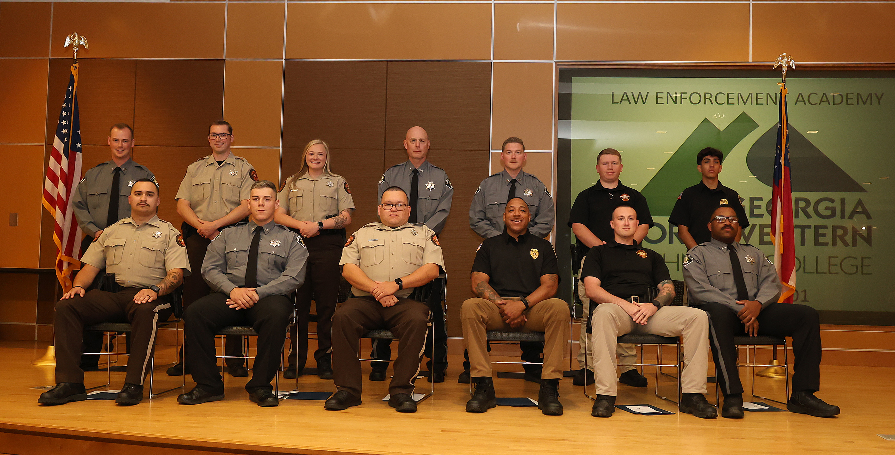 Graduates of GNTC’s Basic Law Enforcement Training Class #BL11-2025-01 are (from left, front row) Justin Middlebrooks, Joshua McClure, Kevin Lively, Greg Gregory, Isaac Casey, Jamal Bragg, (back row) Tucker Wilson, James Williams, Emalee Weaver, Scott Thompson, Zachary Taylor, Wesley Stewart and Ethan Patino.