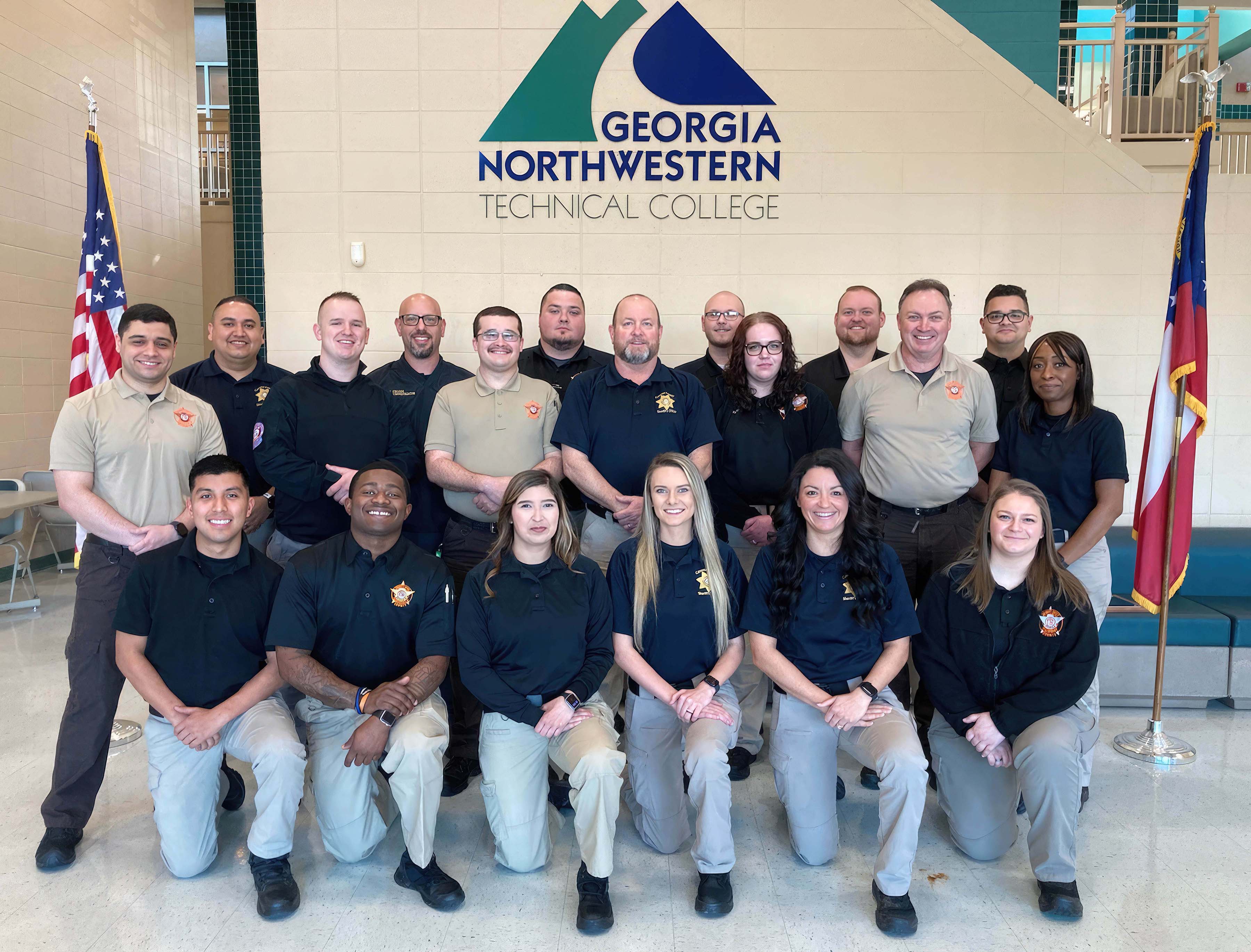 Graduates of GNTC’s Basic Law Enforcement Training Class BPC1-2023-03 are (from left, front row) Everildo Ramirez Ibzan, Cameron Cobb, Jennifer Nunez, Gracie Freeman, Raven Henry, Lacey Dodd; (back row) Mauro Ramos, Jesus Rendon, Corbin Southern, Jason Cruise, Garrett Silvers, Christopher Magness, Kevin Stricklin, David Stafford, Kelly Mitchell, Lane Wilson, David Dollar, Gabriel Vasquez-Marte and Rashondra Archie.