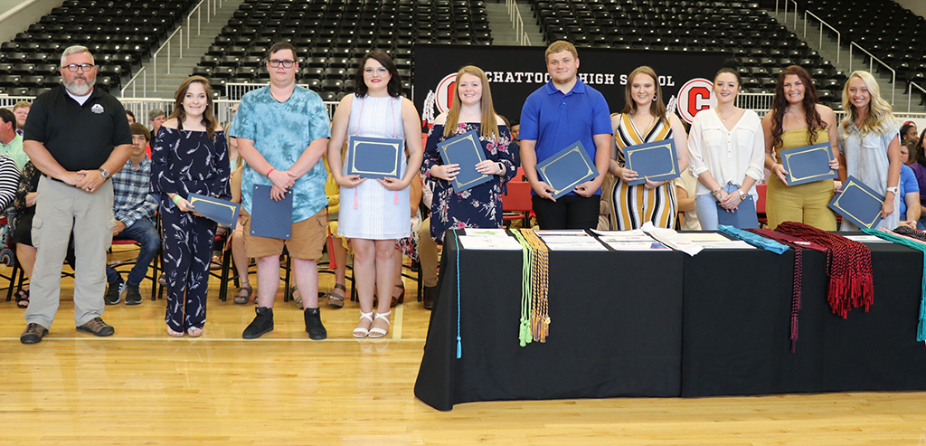 The Chattooga High School Alumni Scholarship was presented to ten students at Chattooga High School this year. This scholarship was made possible by an alum of Chattooga HS. Jim Pledger (left), director of the Law Enforcement Academy at GNTC, presented this year’s scholarship to (from left to right) Kristen Ratledge, Elijah Ard, Courtney Burgess, Destiny Cabe, Jacob Lacey, Leigha McDaniel, Ashelyn Watson, Annie Morgan McGraw and Alexandria S. Mitchell. The scholarship was also awarded to Kimberley Michelle Chandler (not pictured).