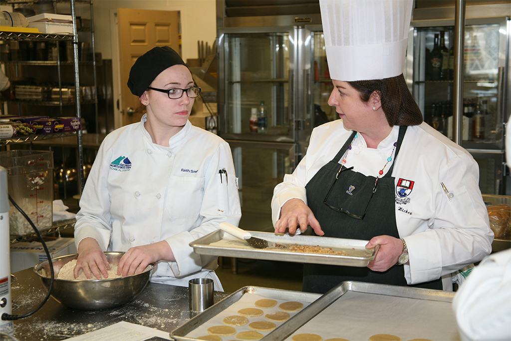 Faith Smith (left) of Calhoun and Chef Judith Hickey (right), of the Waterford Institute of Technology in Ireland, prepare the desserts for the “Taste of Ireland” reception and dinner.