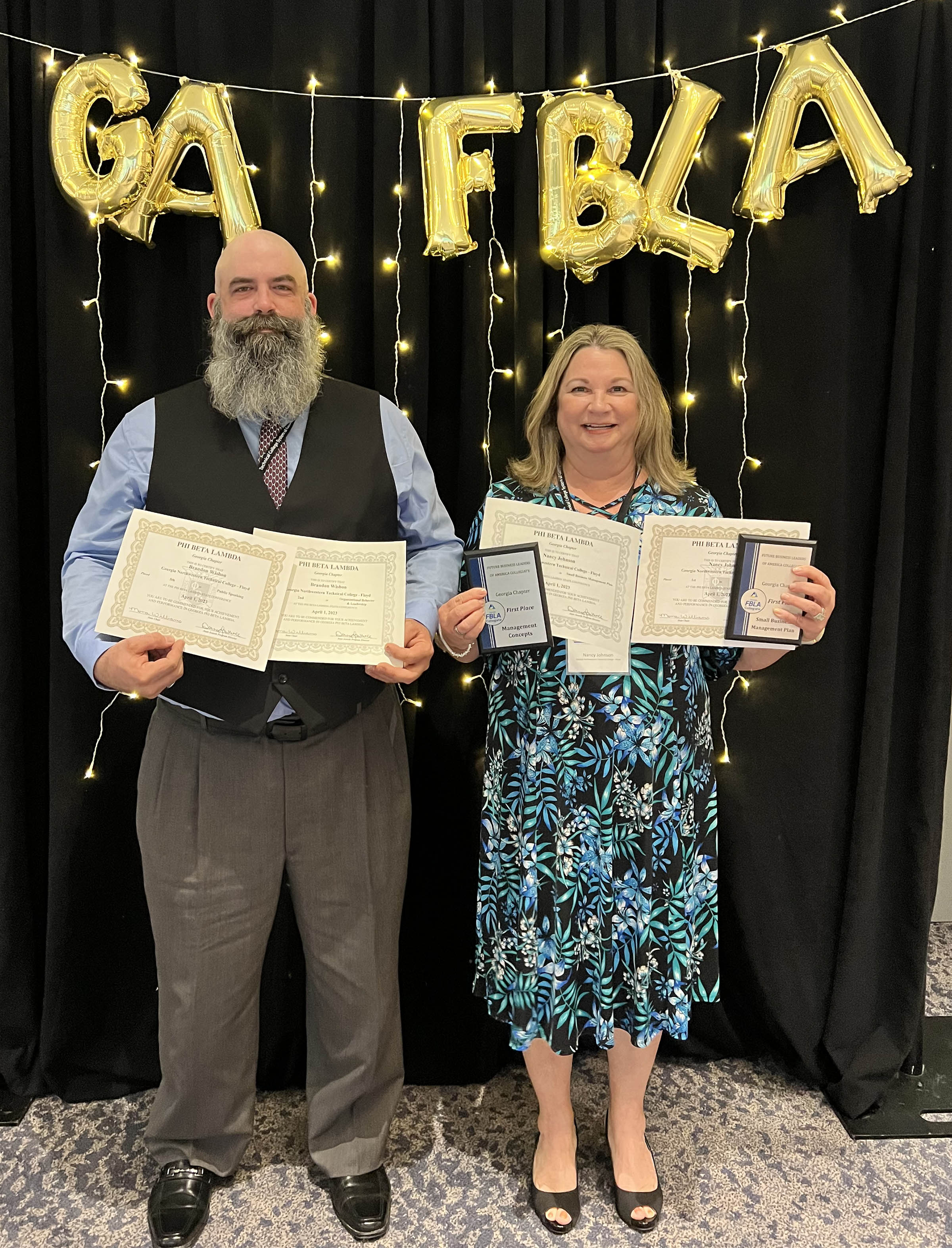 GNTC students Brandon Wishon (left) and Nancy Johnson display their awards after the Georgia FBLA competition.