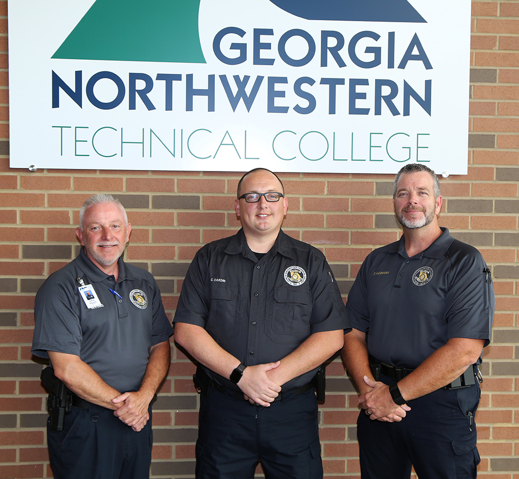 Chad Cardin (center) chief of police at GNTC, poses for a picture during a regional police chief meeting held on the Gordon County Campus in Calhoun. Also pictured is Steve Blevins (left), police officer at GNTC’s Walker County Campus, and Gary McConathy (right), police lieutenant at GNTC’s Gordon County Campus. 