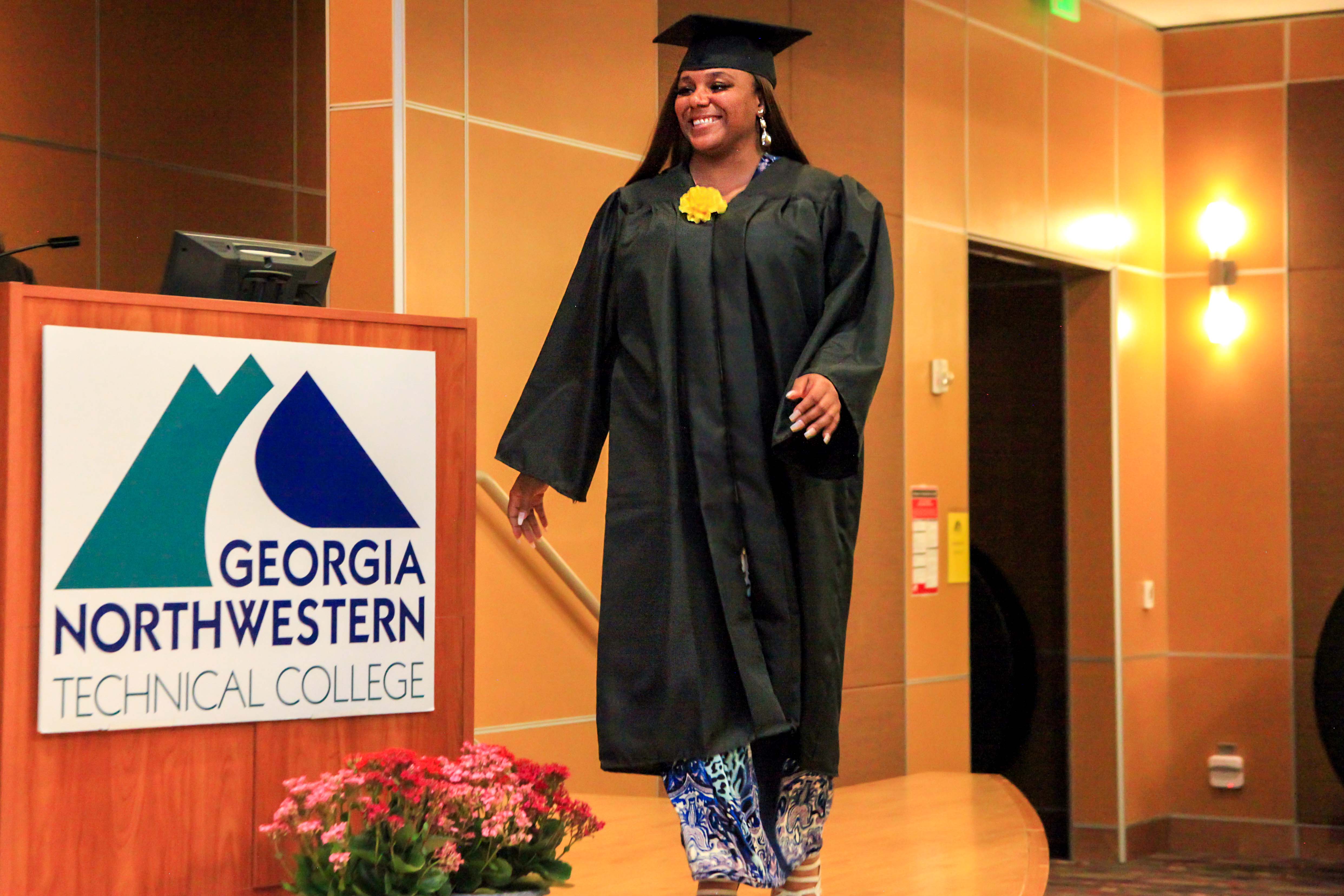Natasha Brown prepares to walk across the stage of the Conference Center at GNTC’s Gordon County Campus on Thursday, June 17, after earning her GED® diploma.
