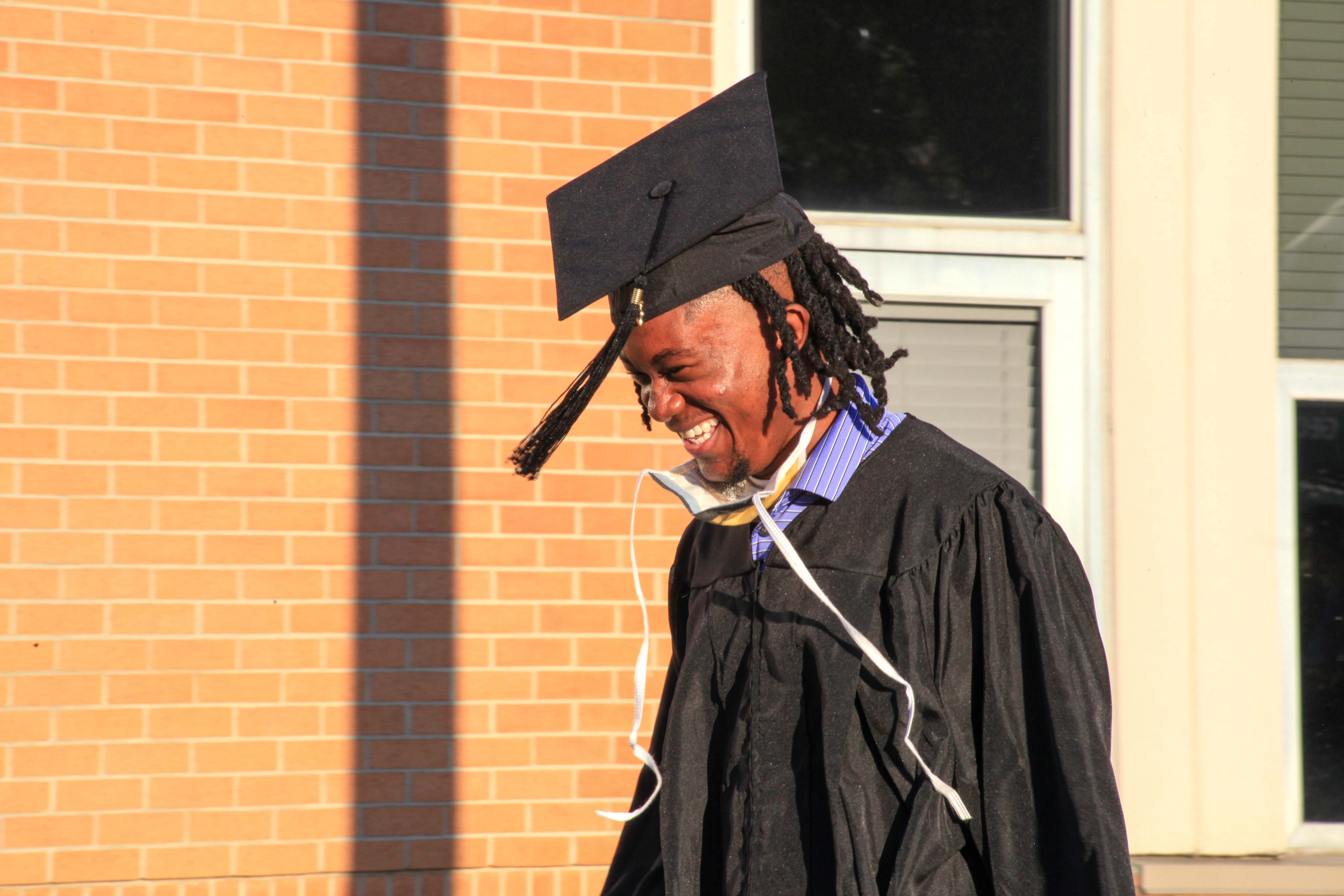 Quincy Chambers, a Respiratory Care major from the Floyd County Campus, smiles as he walks down the blue carpet to receive his associate degree during GNTC’s 2021 Spring Drive-Thru Commencement Ceremony on Thursday, May 6.