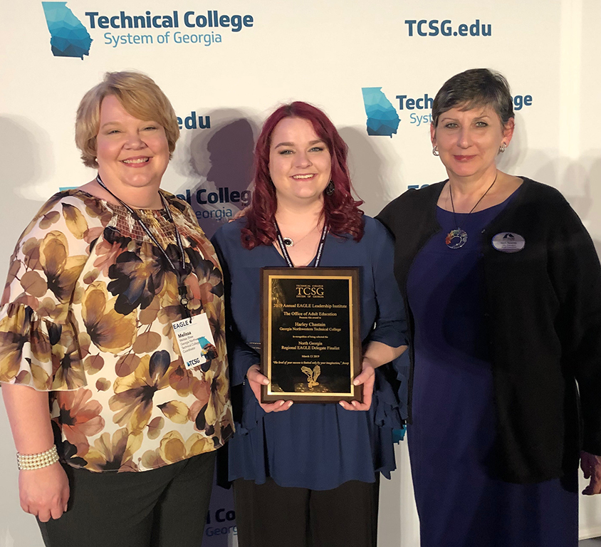Harley Chastain (center) was chosen as a regional finalist for the State EAGLE Award by the Technical College System of Georgia. Also pictured is Kerri Hosmer (right), vice president of Adult Education at GNTC, and Lisa Shaw (left), data and testing manager for Adult Education at GNTC.