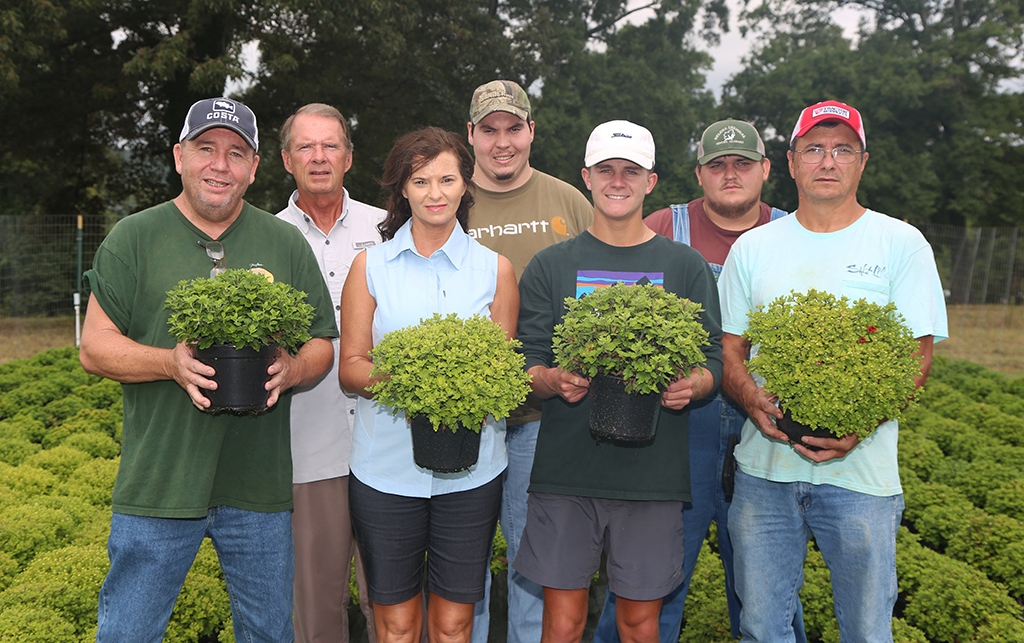 Horticulture students pose with the mums that will be on sale for $5 each at GNTC’s Floyd County Campus starting Sept. 17. Back row (from left to right) David Warren, director of Horticulture at GNTC; Bailey Ellenburg; and Justin Womack. Front row (from left to right) Mark King, Terra Black-Coontz, Lane Strickland, and Nick Barton.