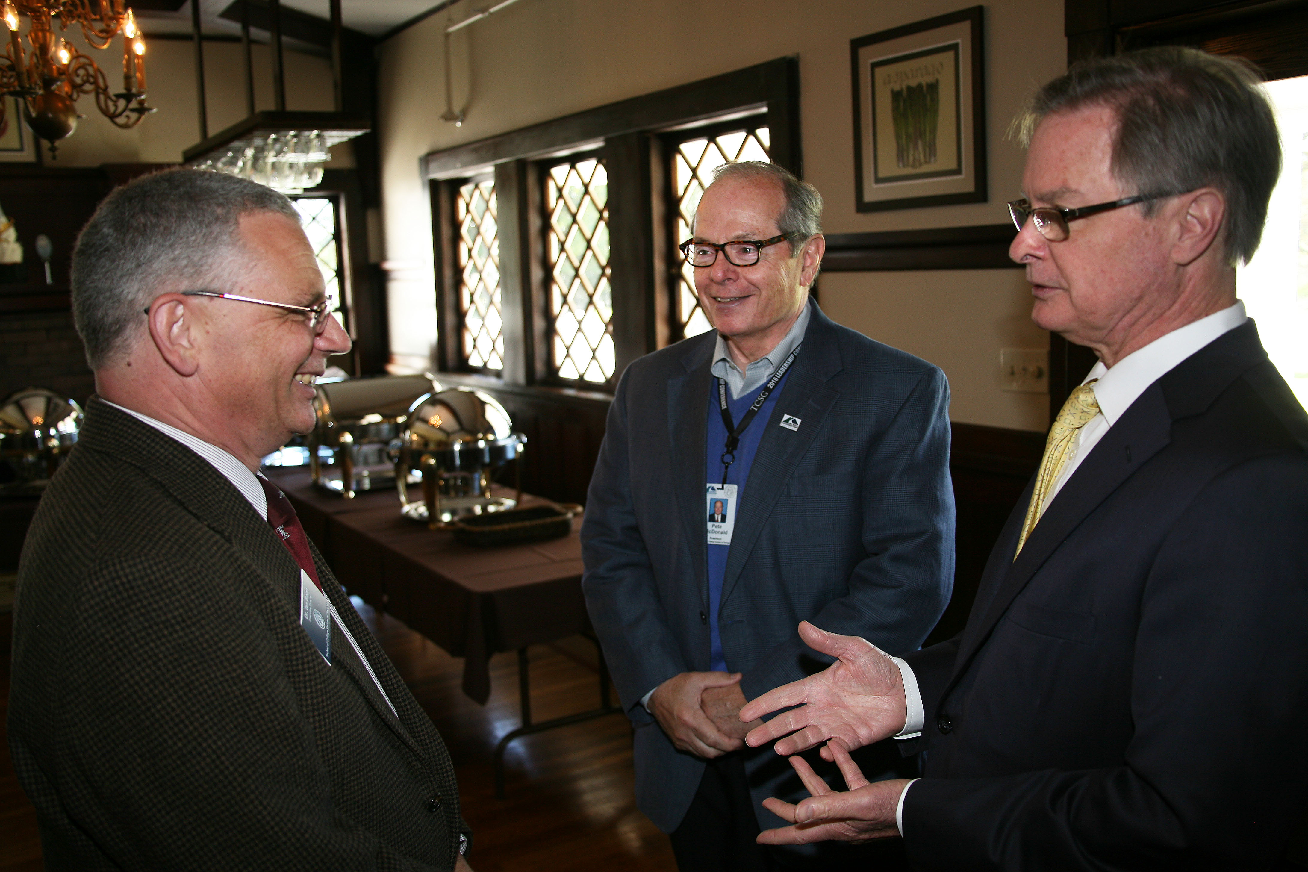 Dr. Ian Bond (left), executive director of the International Center, TCSG; Pete McDonald (center), president, GNTC; and Al Hodge (right) president and CEO, Rome Floyd Chamber, have a conversation before lunch begins at the Woodlee Building on GNTC’s Floyd County Campus.