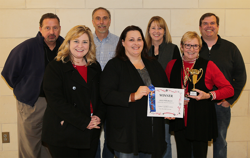 From left to right: David McBurnett, Kristen Kinsey, John Gentry, Kristie Eberhart, Heidi Popham, Nina Lovel, and Brad Cooper.