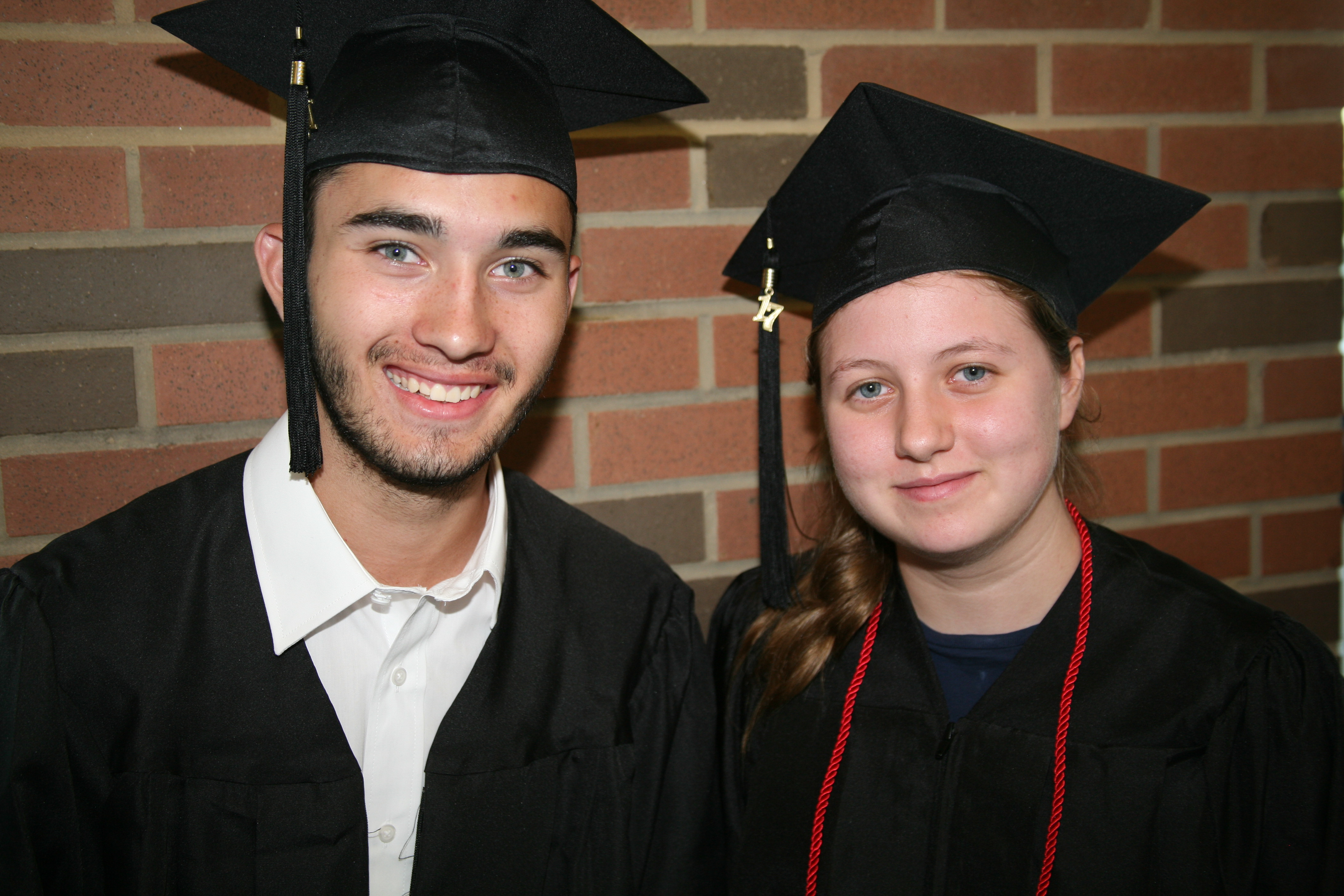 Isaac Streetman (left) of Rockmart and Persia Suarez (right) of Cedartown line up before Processional.