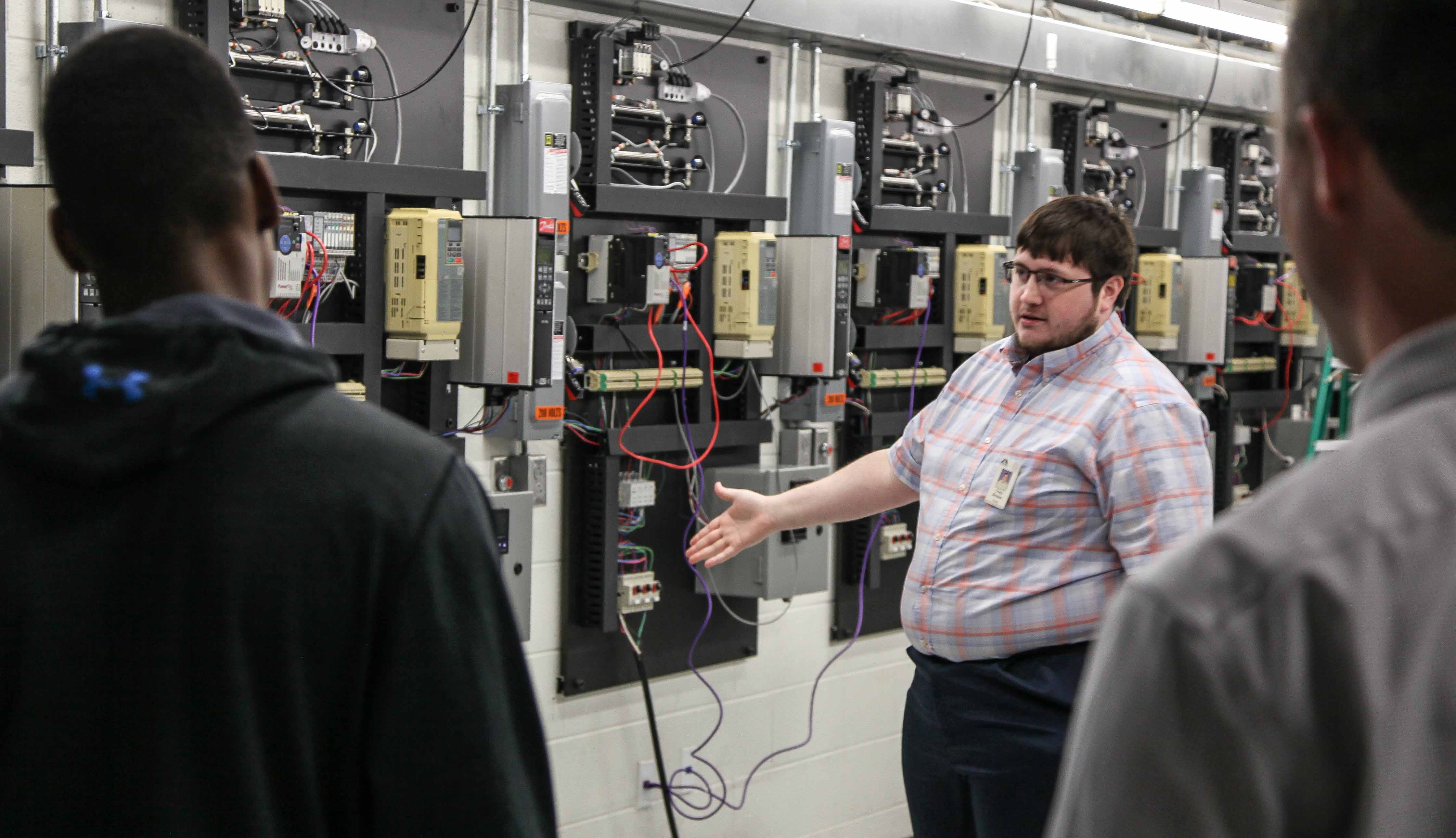 Georgia Northwestern Technical College Electronics Technology Instructor Cody Brewer speaks with students from Ringgold High Schools’ Career Exploration program touring GNTC’s Catoosa County Campus in Ringgold, Georgia.