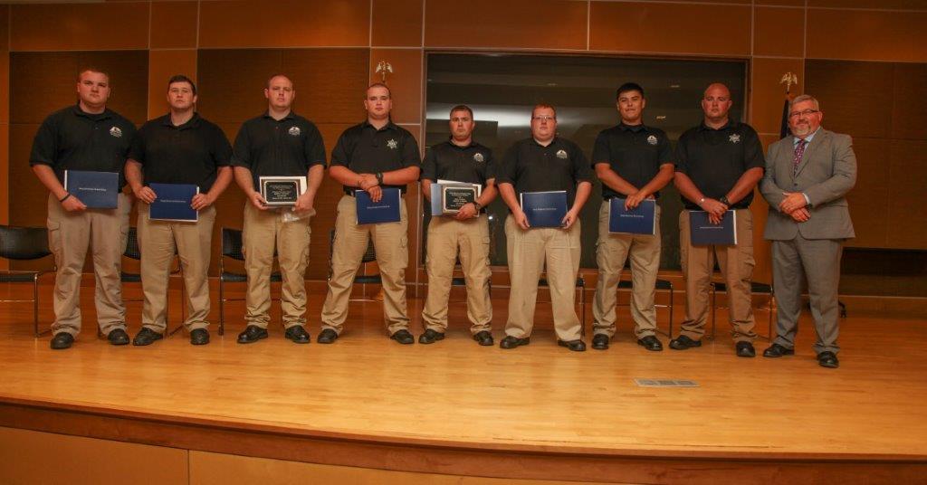 The graduating class of the July 2018 Basic Law Enforcement Academy at Georgia Northwestern Technical College. Shown, from left, are Mason Woodard, Matthew Wilson, Justin Watson, Isreal Smith, Joshua Morse, Jonathan Martin, Hunter Densmore, Dustin Bruce, and Georgia Northwestern Technical College Law Enforcement Academy Director Jim Pledger.