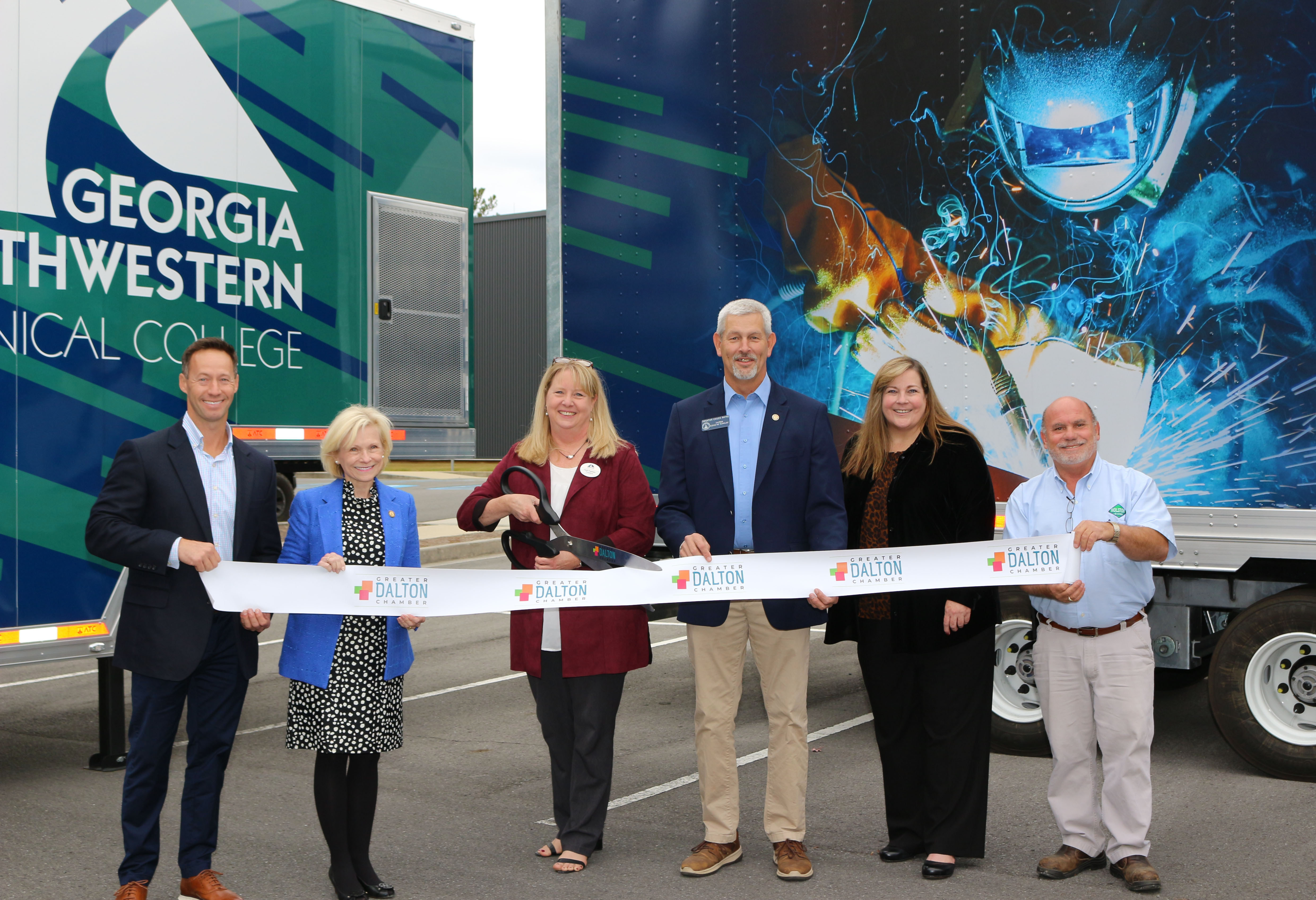 (From left) Chris Schier, vice president of Business Development at Technical Training Aids; state Rep. Katie Dempsey; Dr. Heidi Popham, president of GNTC; state Sen. Chuck Payne; Angela Berch, vice president of Economic Development at GNTC; and Rick Minshew, sales representative at Holston Gases Inc. 