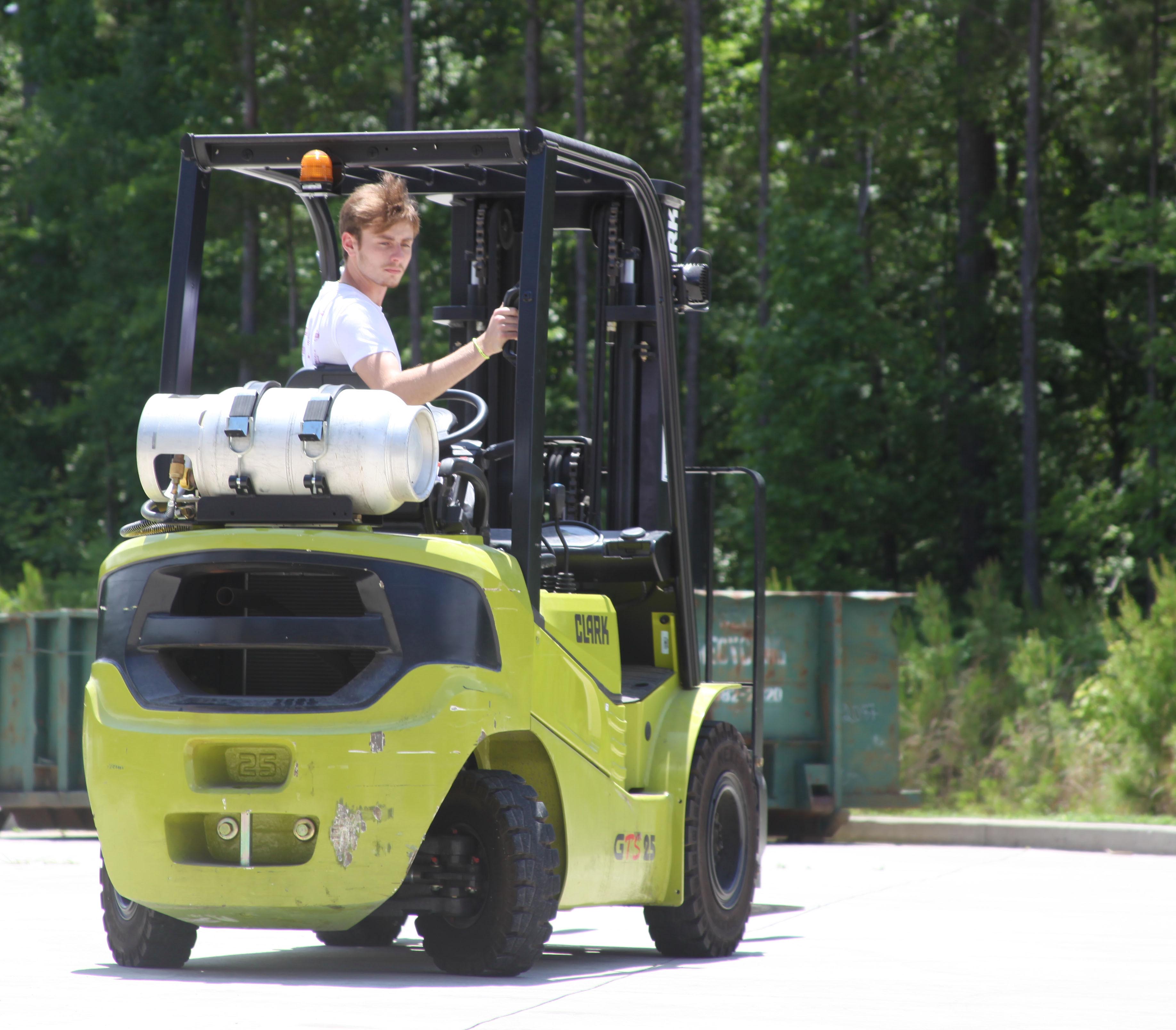 Tyler Frazier practices backing up. Students were certified to operate the forklift after successfully completing the driving test.