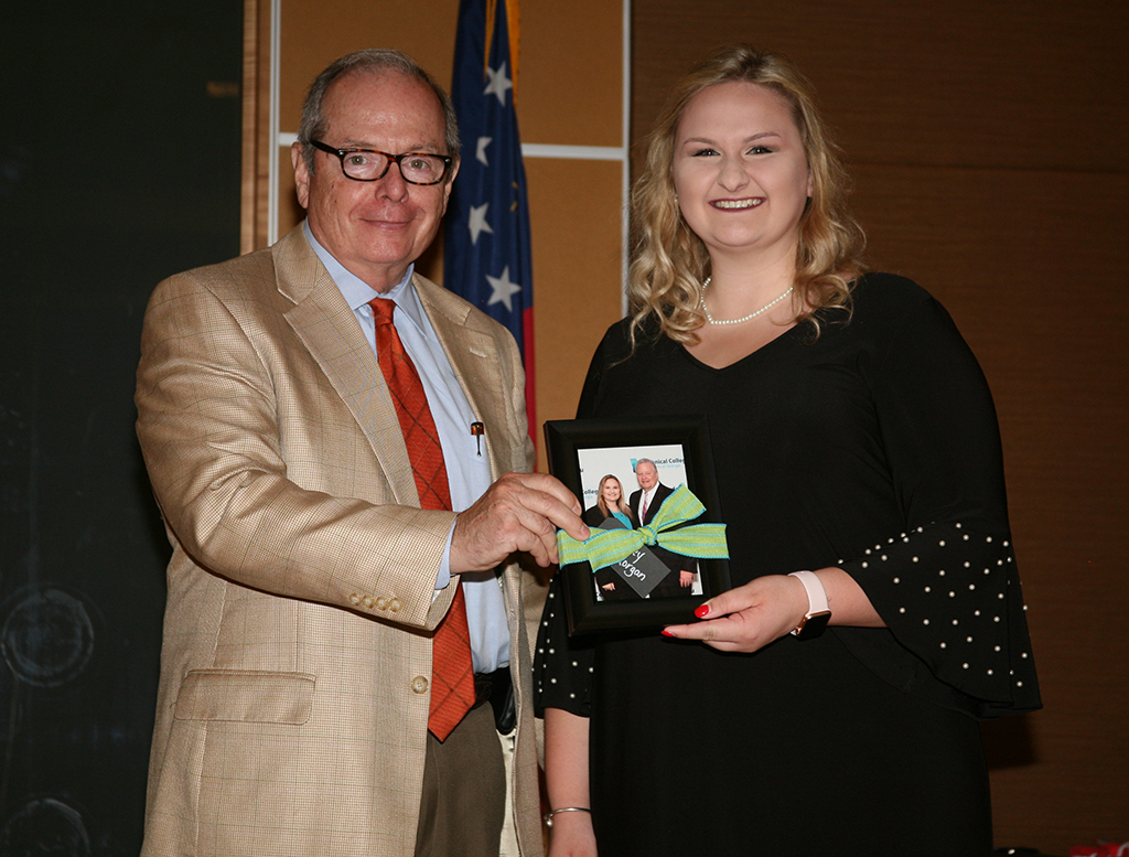 Pete McDonald (left), president of GNTC, congratulates Macey Morgan, GNTC’s GOAL Award winner for 2018. Morgan also was named one of nine regional finalists to become the 2018 Student of the Year for the Technical College System of Georgia. 