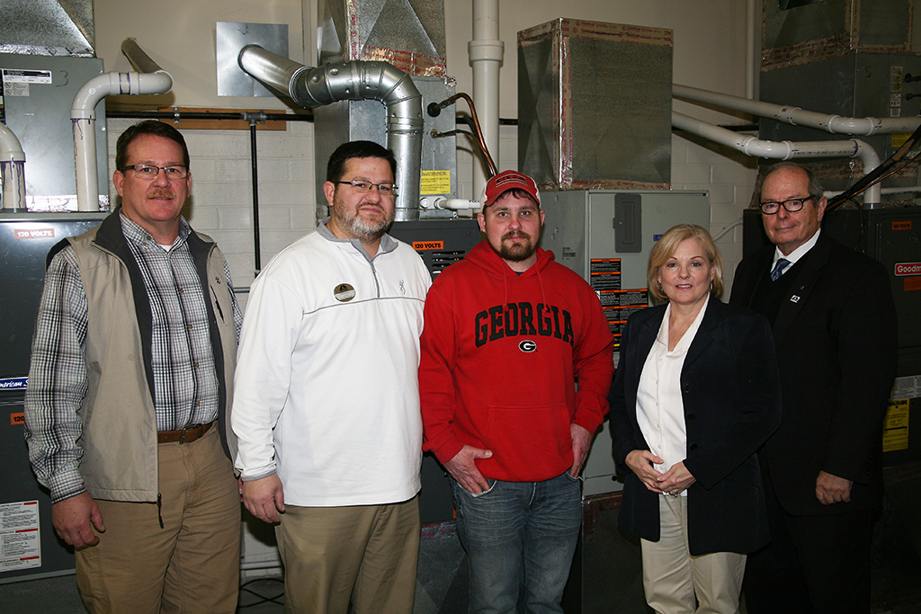 (From left to right) Barry Williams, dean of Academic Affairs at GNTC; Chad Wheat, director of the Air Conditioning Technology program at GNTC, Chris Roberson, Phoenix Patriot Foundation’s Veteran Scholarship recipient; Michelle Beatson, administrative liaison to Institutional Advancement at GNTC; and Pete McDonald, president of GNTC, pose for a picture in the Air Conditioning Technology lab on the Floyd County Campus in Rome.