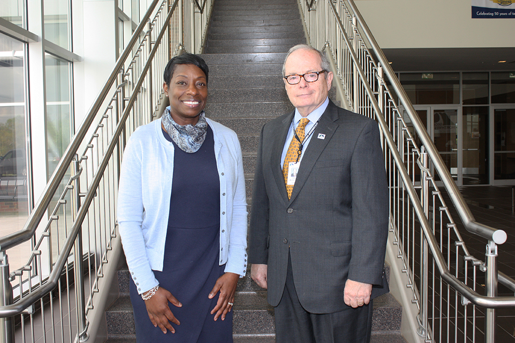 Pete McDonald (right), president of GNTC, congratulates Cassandra Carter Wheeler (left), northwest regional director at Georgia Power, for becoming the newest member of GNTC’s Board of Directors.