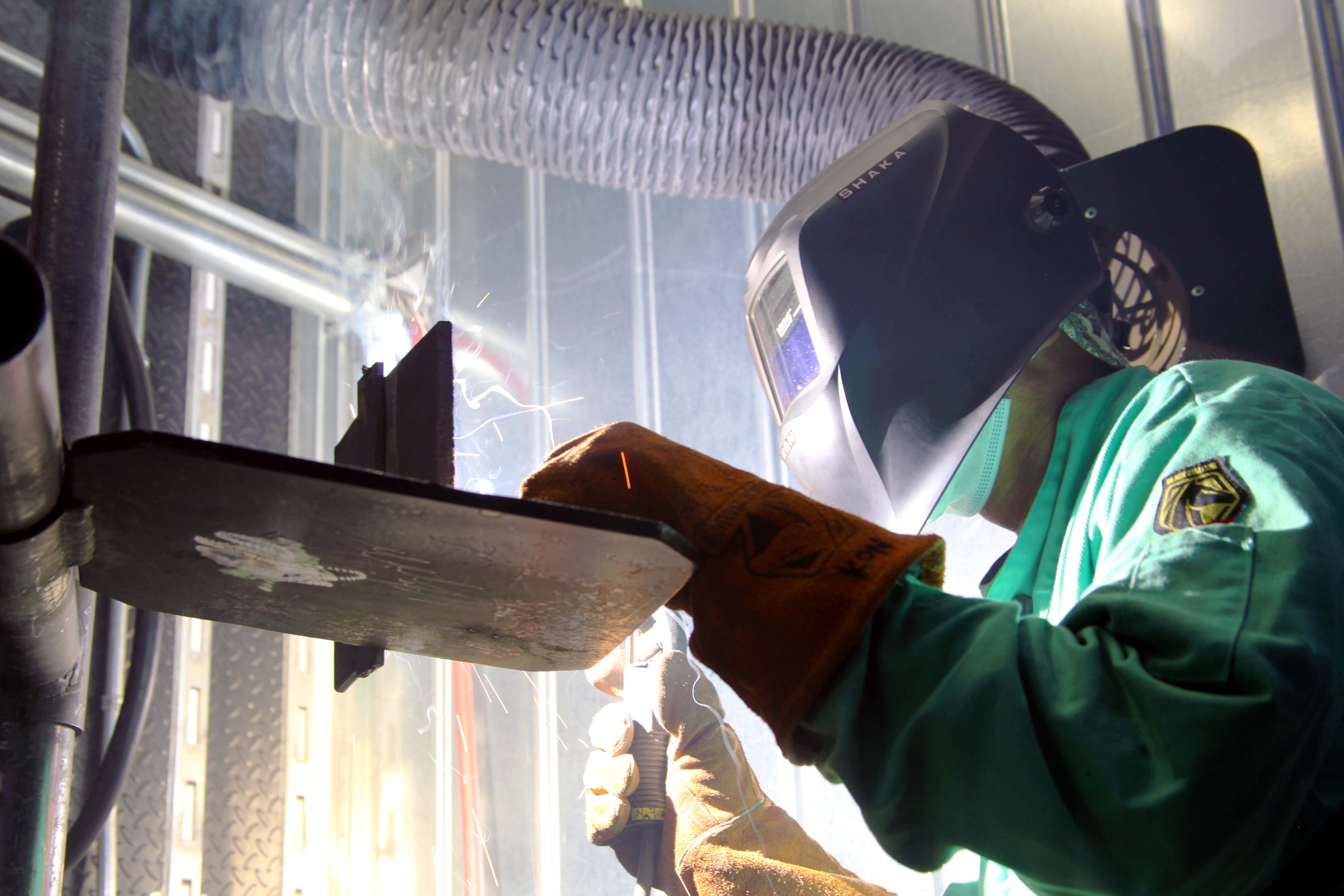 Sarin Kon practices his welding techniques after class at the Floyd County Prison. By early September, Kon and 11 other offenders will be fully certified in shield metal arc and flux core welding.  