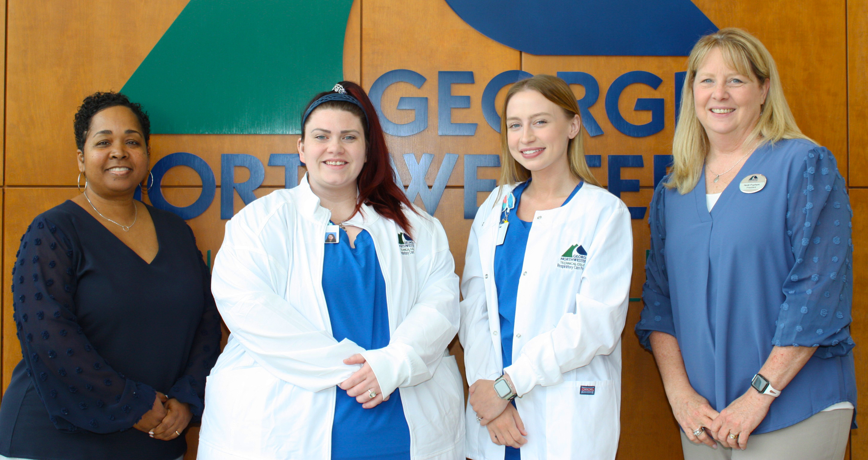 (From left) Zenia Bratton, program director and instructor of Respiratory Care at GNTC; students Reanna Story and Brook Atkinson; and Dr. Heidi Popham, GNTC president, celebrate the awarding of the scholarships.