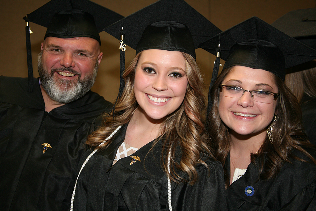 Ron Satterwhite (left), Lauren Sherwood (center), and Peggy Shiflett (right) line up before Processional during last year’s Spring Commencement Ceremony in 2016.