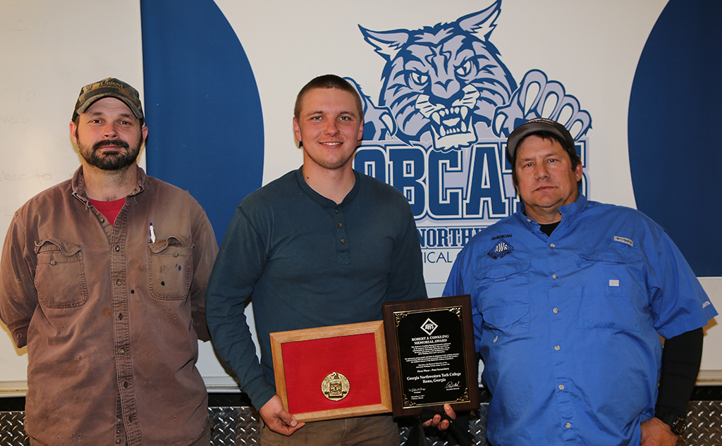 GNTC student Ryan Fincher (center) of Cedartown was presented with the Robert J. Conkling Memorial Award by Rene’ Engeron (right), chairman of the Atlanta section of the American Welding Society. Also pictured is Joe Burrage (left), director of the Welding and Joining Technology program at GNTC.