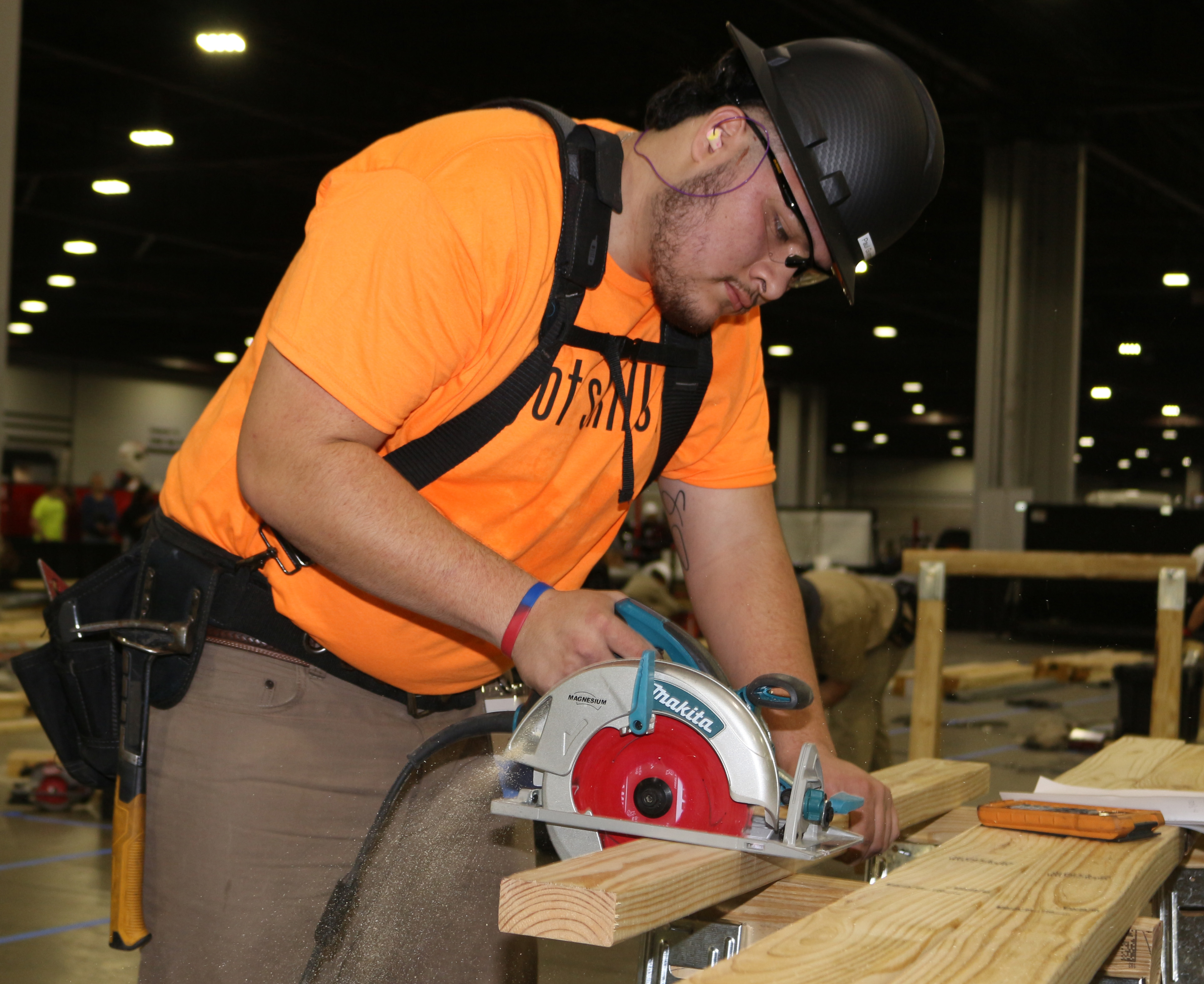 GNTC student Johncarlos “Paul” Gerrero cuts wood in the Carpentry competition.