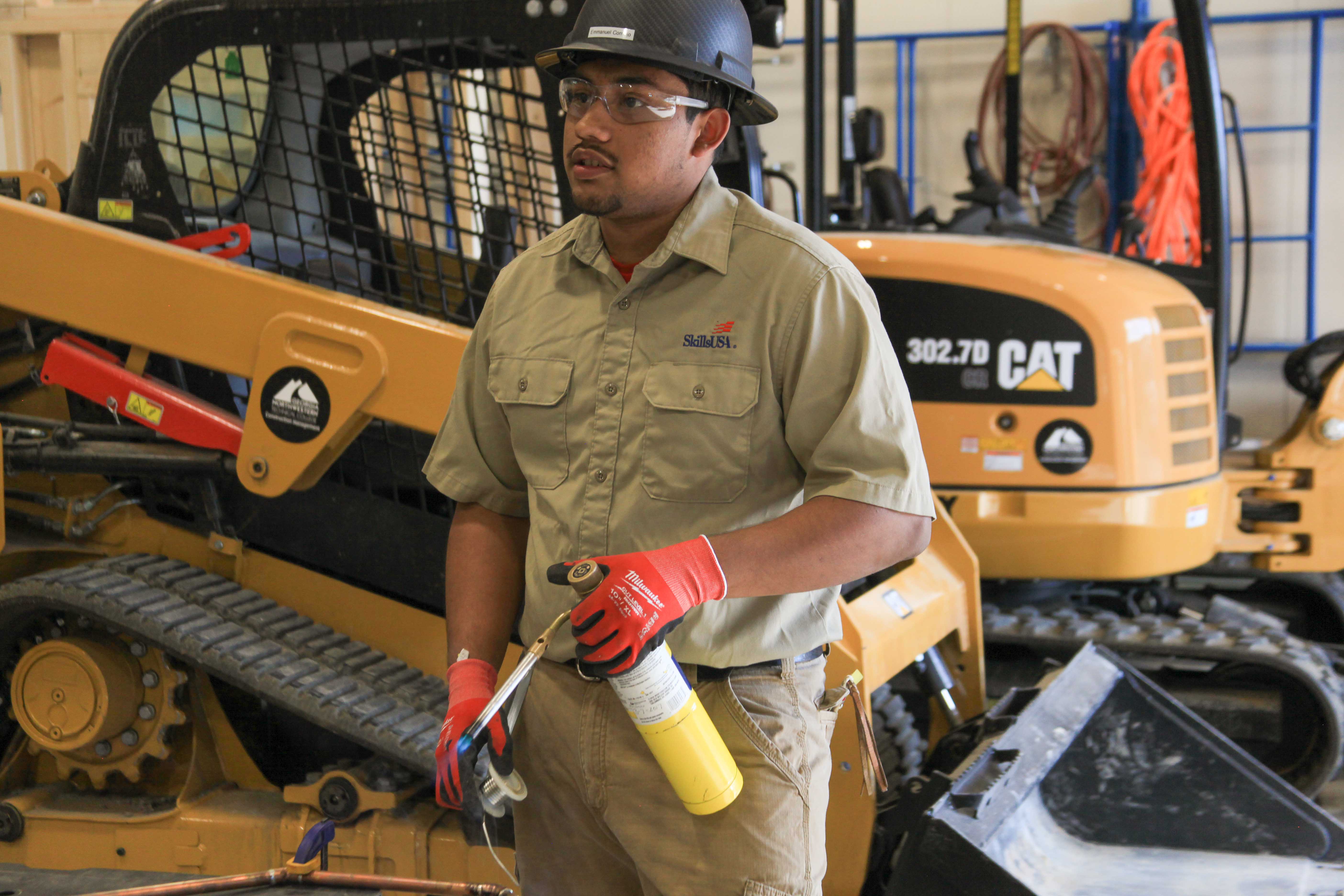 GNTC student Emmanuel Cornejo practices for the SkillsUSA National Leadership and Skills Conference and SkillsUSA Championships plumbing competition. Cornejo received a gold medal in Plumbing at SkillsUSA Georgia. 