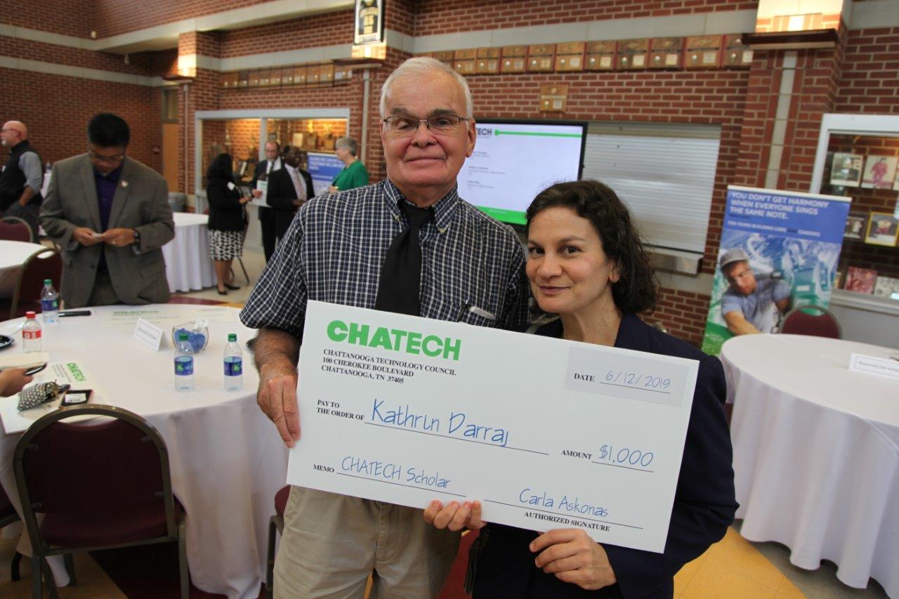 Georgia Northwestern Technical College CISCO & Computer Information Systems Program Director Dr. Dwight Watt poses with his student Kathrin Darraj after an awards ceremony at Chattanooga’s Howard School on June 12.”