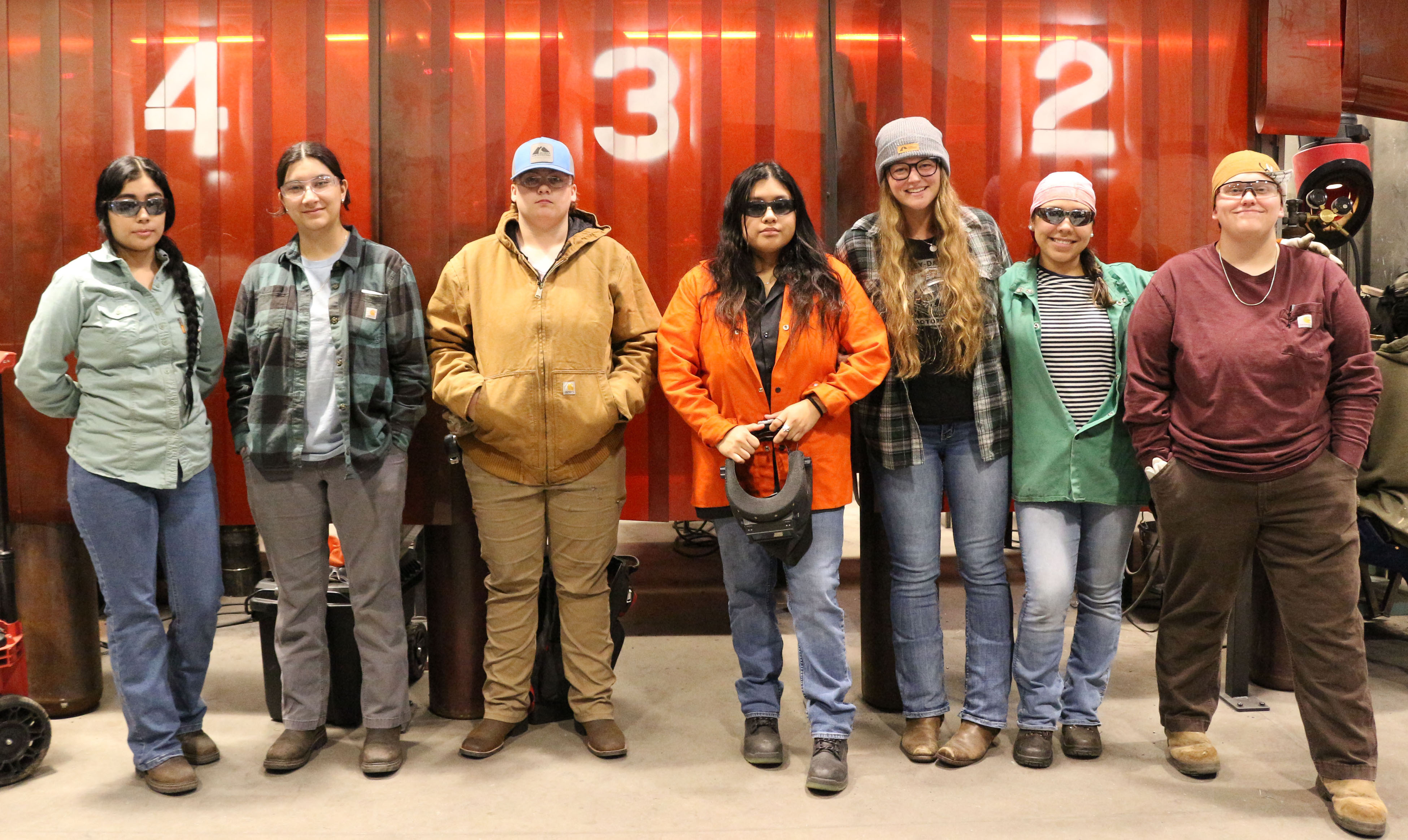 (From left) Arianna Rodriguez, Yosdel Castaneda, Kelsey Martin, Heidi Martinez, Molly Satterfield, Armida Vicente and Sophia Shepherd are welding students at GNTC’s Whitfield Murray Campus in Dalton.