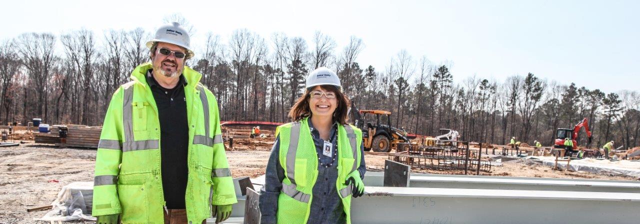 Chuck Greenway, Balfour Beatty Construction Senior Superintendent (left), poses with Dr. Ginger Mathis, Georgia Northwestern Technical College Associate Vice President of Special Projects on the Phase II Construction Site at the college’s Whitfield Murray Campus.