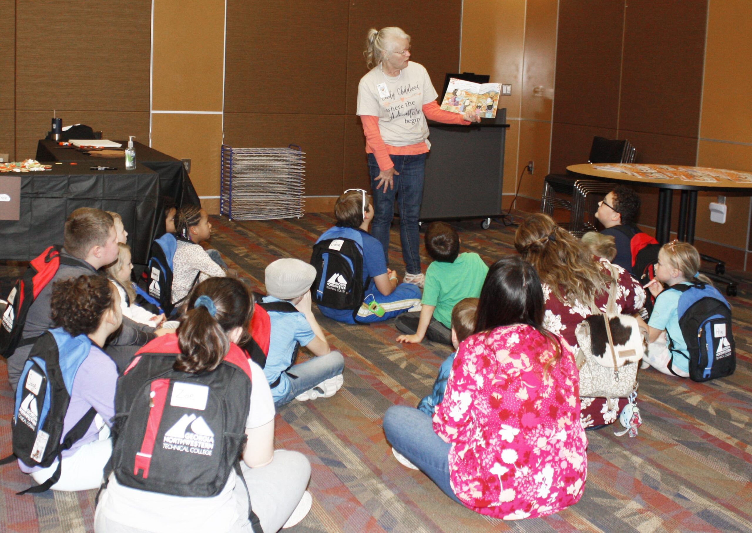 LaVerne Pruitt, GNTC instructor of Early Childhood Care and Education, reads “Let it Fall” to children. 