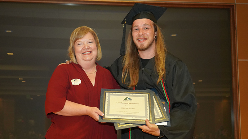 Lisa Shaw, vice president of Adult Education at GNTC (left), poses with Accelerated Academy graduate Tristan Evans