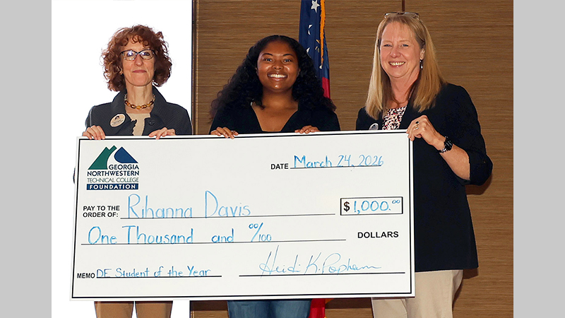 GNTC’s 2026 Dual Enrollment Student of the Year Rihanna Davis (center) accepts a $1,000 scholarship, provided by the GNTC Foundation, from Sarah Egerer (left), GNTC Foundation administrator, and Dr. Heidi Popham, president of GNTC.