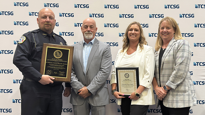 (From left) Chad Cardin, GNTC Campus Police chief; Ed Densmore, state certification director for the Georgia Association of Chiefs of Police; Kayla Franks, GNTC Campus Police lieutenant; and Dr. Heidi Popham, GNTC president.