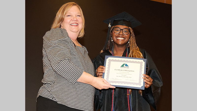 Lisa Shaw, vice president of Adult Education at GNTC, congratulates Amaris Peace Melodye Rankin