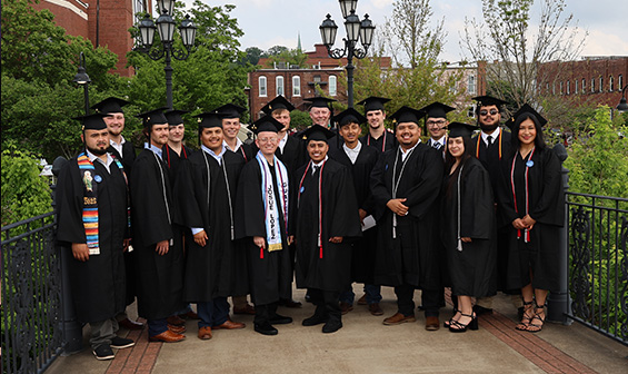 Donnie Holmes with Graduates