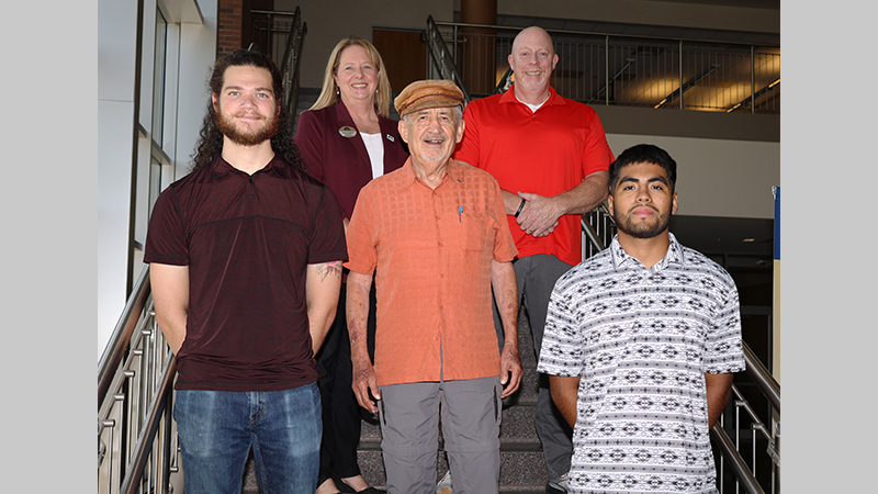 (From left, front row) Jackson Woodard, scholarship recipient; Octavio Perez; Jesus Arellano, scholarship recipient; (back row) Dr. Heidi Popham, president of GNTC; and Donny Holmes, program director and instructor of Construction Management at GNTC.